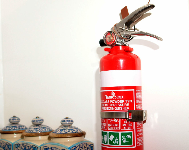 Fire extinguishers and fire blankets